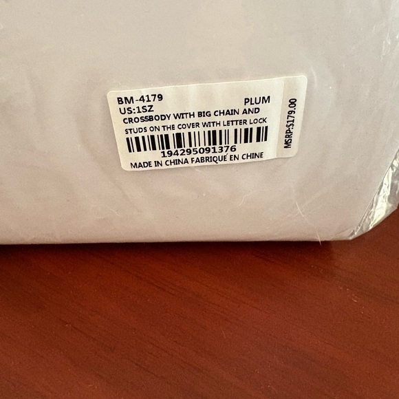 Badgley Mischka Plum and gun metal
Studded Handbag - NWT - Picture 10 of 12